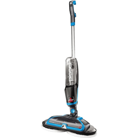 Ce laveur de sols combine une prise en main par poignee et un mouvement rotatif